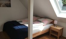 Schlafzimmer mit Doppelbett