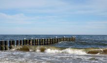 Strandspaziergang bei rauher See