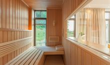 Schlafzimmer 1 mit wohnungseigener Sauna