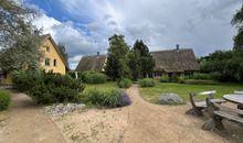 Ferienhaus Peeneblick - Wohnzimmer mit Kamin 2