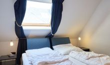 Schlafzimmer mit Doppelbett