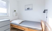 Schlafzimmer mit Einzelbetten im EG