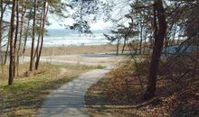 Rotes Strandhaus mit Boot am Salzhaff, 50m zum Strand - Ostsee - Naturstrand - Ferienhaus direkt am Ostsee Strand - 4 Personen - Wlan