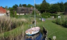 Ferienappartements unterm Reetdach mit Seeblick