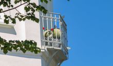 Überdachte Terrasse mit Strandkorb