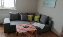 3-Raum-Ferienwohnung mit gemütlicher Sitzecke und TV
