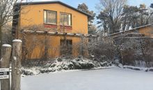 UNO und TRES Doppelhaus mit Parkplatz im Winter