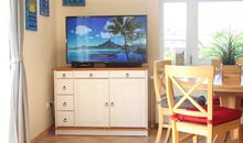Essecke und TV-Bereich im Wohnzimmer